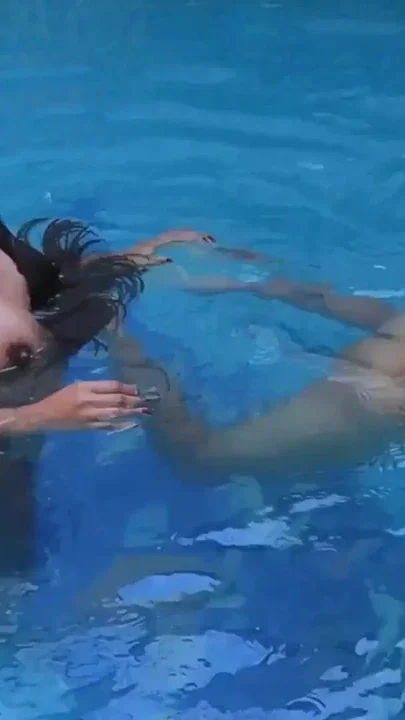 Intense and uncontrolled fucking in the middle of the pool with a pregnant woman Clip 3