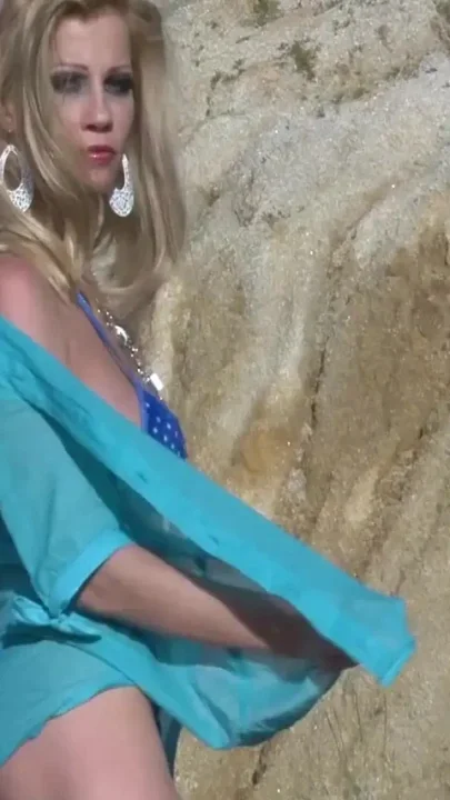 Sexy blonde shows off her hot body outdoor