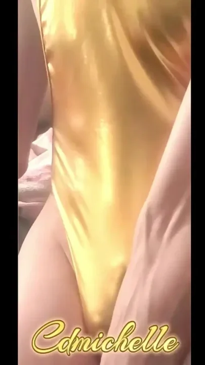 Cdmichelle Wearing Gold Bodysuit