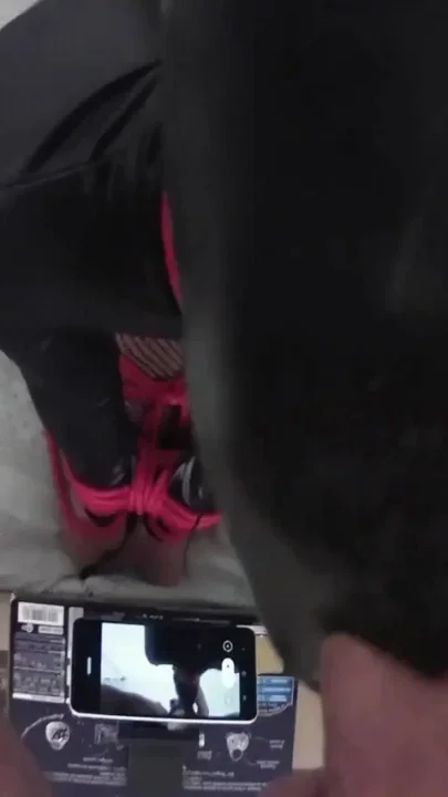 POV video of Laura tied up on her knees on high heels and fishnet pantyhose