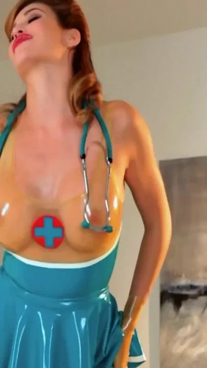 Latex Nurse Fits 2 Hands Into Her Pussy - Ryan Keely