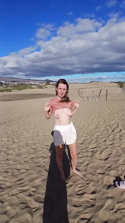 Titty flash on the beach