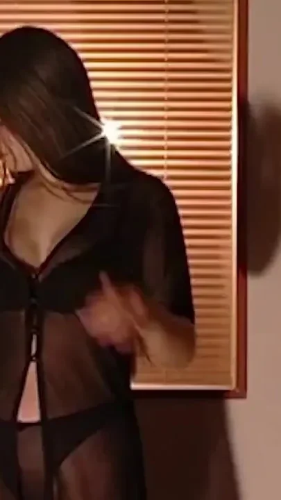 Busty young chick smoking cigarette