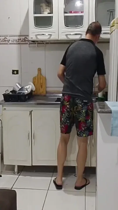 Naked Cougar Alone in the Kitchen