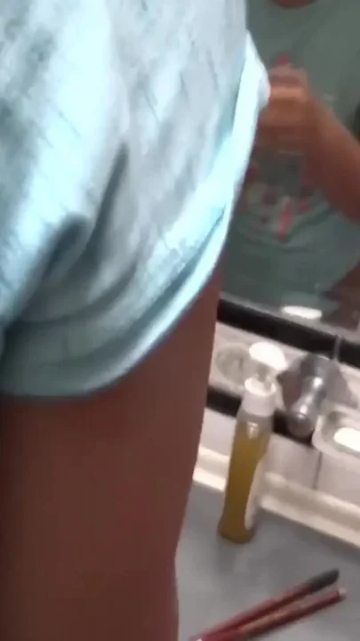 Beautiful Latin stepmother trying on erotic lingerie while stepson records her