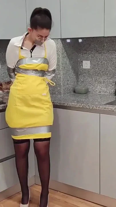 STUNNING WAITRESS SEXY TIGHT APRON FETISH BONDAGE DUCT TAPE Clip 1