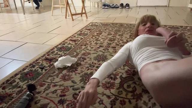 Paulette 77 sucking on a dildo toy