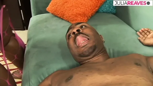 Ebony slut sucks a huge black cock then bends over for a hard fuck