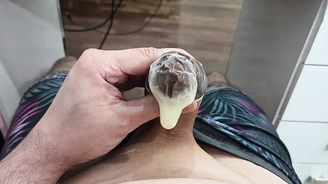 FILLING THE CONDOM WITH MILK