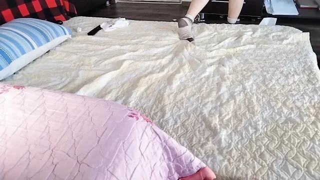 Sexy brunette doing naked chores around the house
