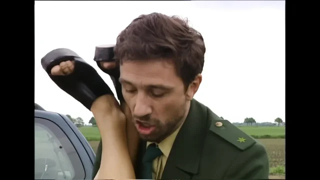 Policeman Has to Watch Her Piss on the Police Car