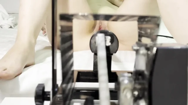 Photographer Shoots Sex with Fuck machine