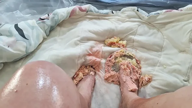 Messy foot sex mashing a cake with painted toes