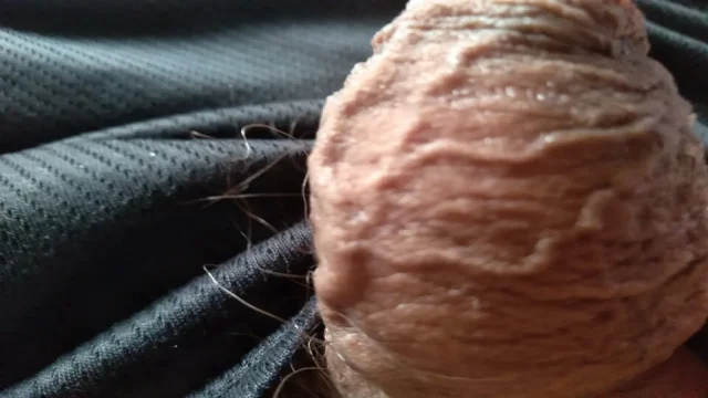 Gay boy shows the glans of his cock