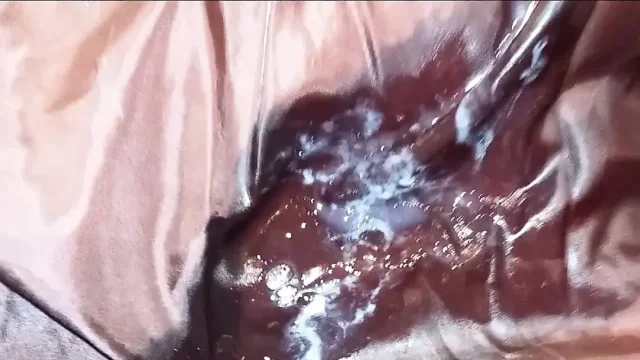 Her cherry red puffercoat lining gets my cum after a long fuck