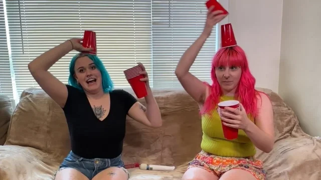 Bea and Lizzy go head to head stacking cups and stripping