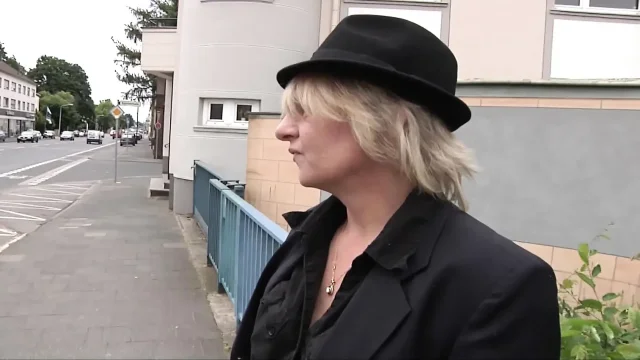 German cougar stuffs herself with big dildo