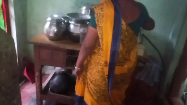 Desi husband who squeezes his wife breasts while she cooks