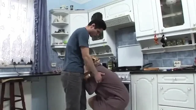 Milf pussy fucking in dogging position in the kitchen