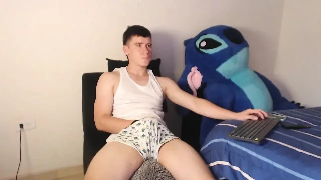 big latino touches his cock over his clothes