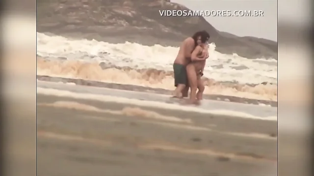 Shameless couple has sex in the shallow sea