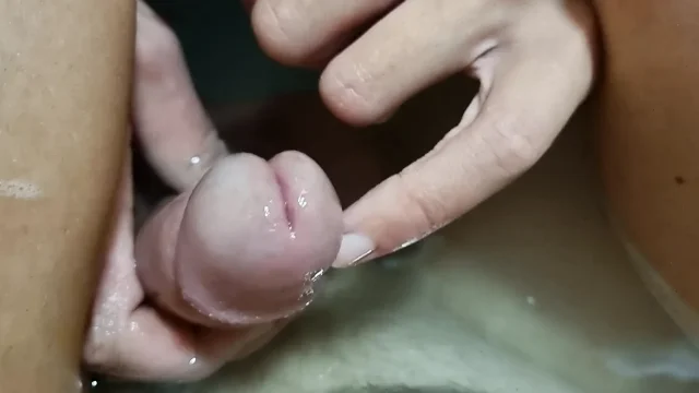 Hot girl plays with her penis in the bathtub inserts her finger into the urethra