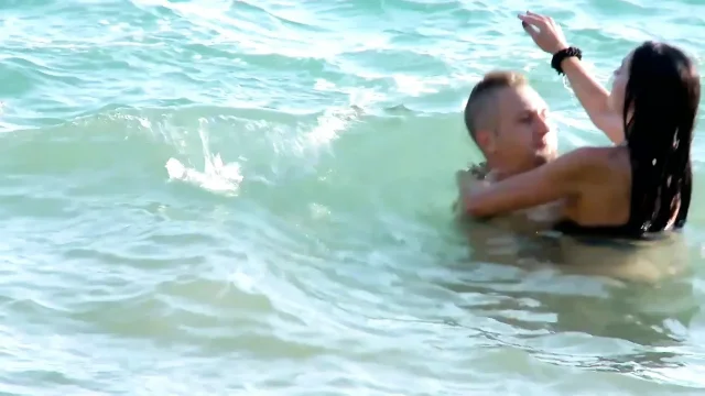 Brunette slut gets fucked doggystyle on the beach