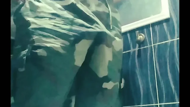A sexy boy is masturbating while taking a shower in the washroom He is having a
