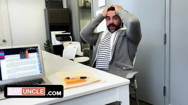Two muscular coworkers are stuck in the office during lockdown and find distraction from boredom