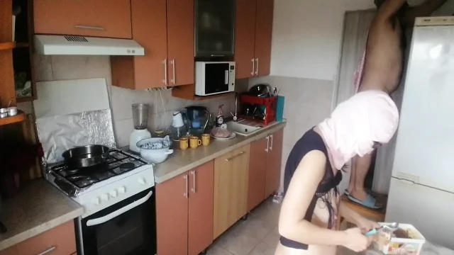 Crazy couple having fun in the kitchen