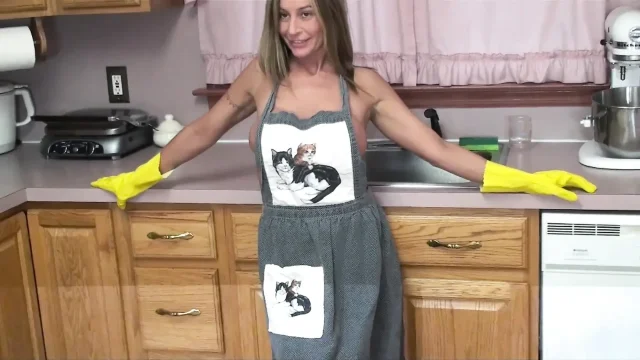 Milf taking a break from doing dishes