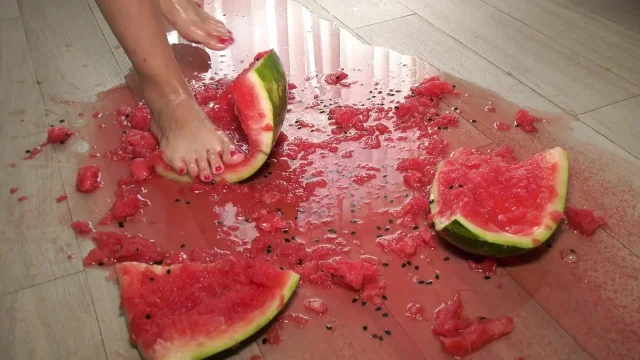 Busty MILF Presents Her Feet and Plays with a Watermelon
