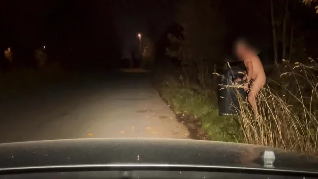 Naked and Jerking barefoot with full beams on at side of road