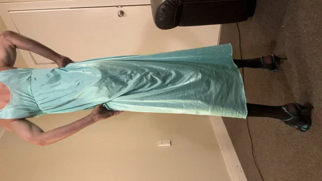 Beautiful green night gown with a sexy black body suit underneath