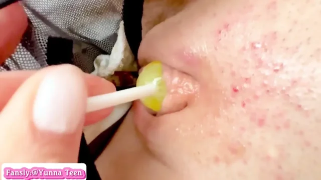 Innocent girl plays with lollipops in her pussy close up