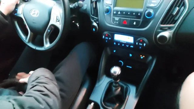 Hot mature stepmom in stockings gives her stepson a footjob in the car while he drives