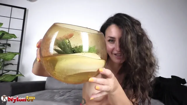 Babe with Hairy Pussy Pisses Into a Angle Bowl
