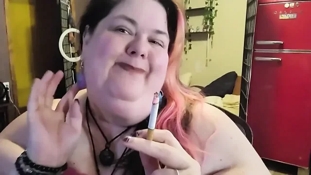 SSBBW Smoking While Playing with My Neck and Massive Arms