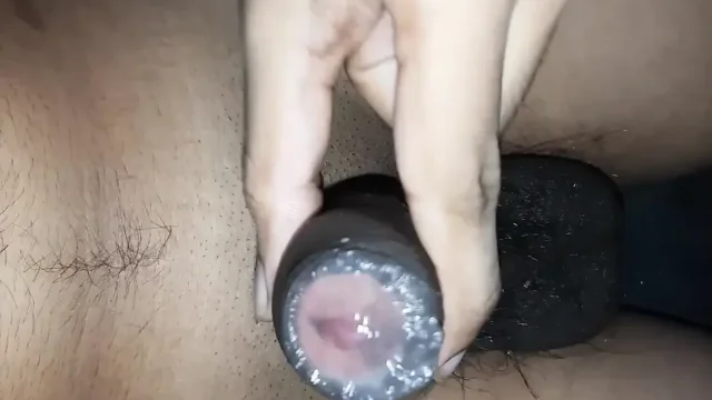 Twink boy masturbating with two finger