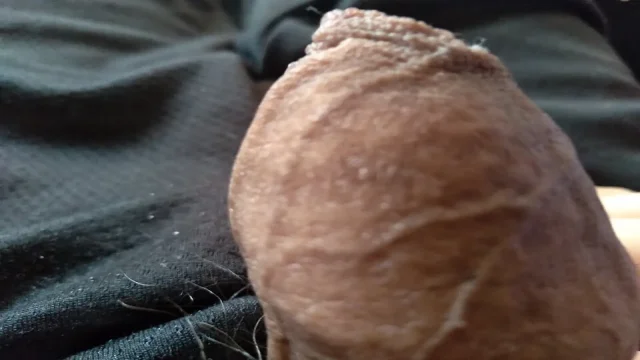 young man handles his large penis with great skill