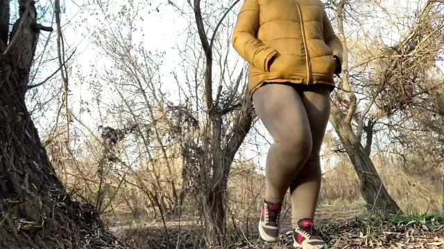 Wet pussy of a mature milf squatting and peeing