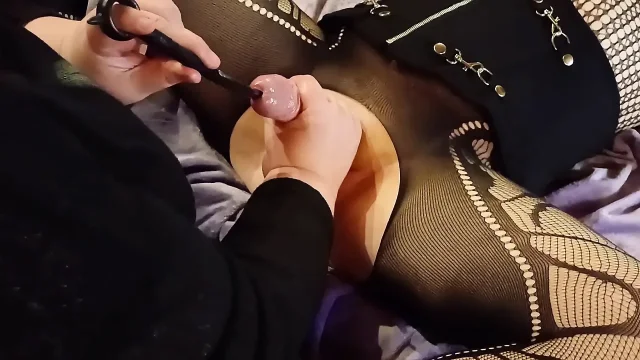 Mistress streches urethra peehole of her sissy with dilator edging