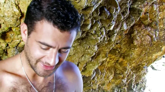 Gorgeous brunette sucks big cock on the beach and gets fucked