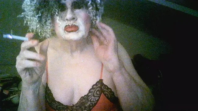 Sarah shitcunt Millward smokes and flaunts herself for custom like the whore she is