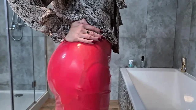 Latex skirt and seamed nylons