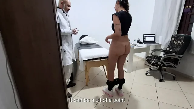 A MILF gets fingered by the proctologist during an anal exam
