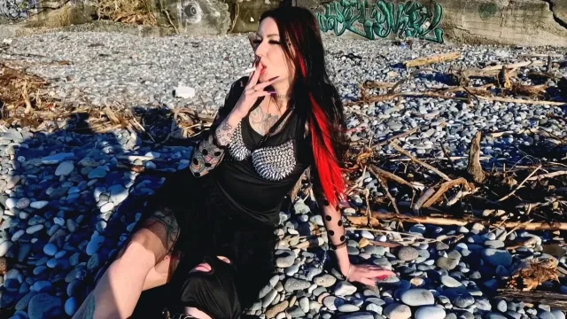 I like to smoke and look at the sea with my human ashtray next to me Cigarette