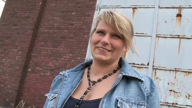 Busty German blonde fucks herself with dildo