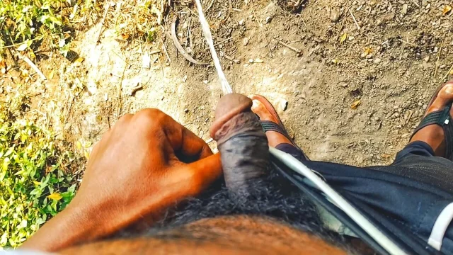 Hairy black indian cock pissing outdoor