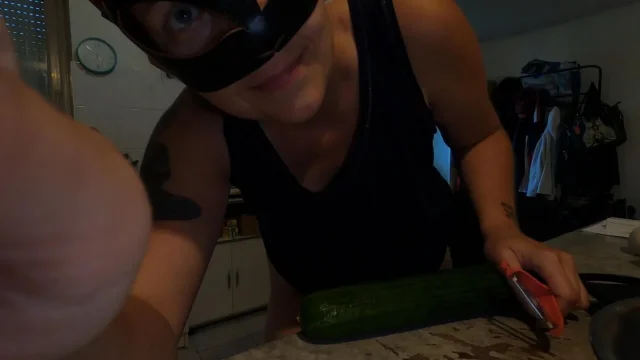 VgWhite prepares cucumber on hot evening